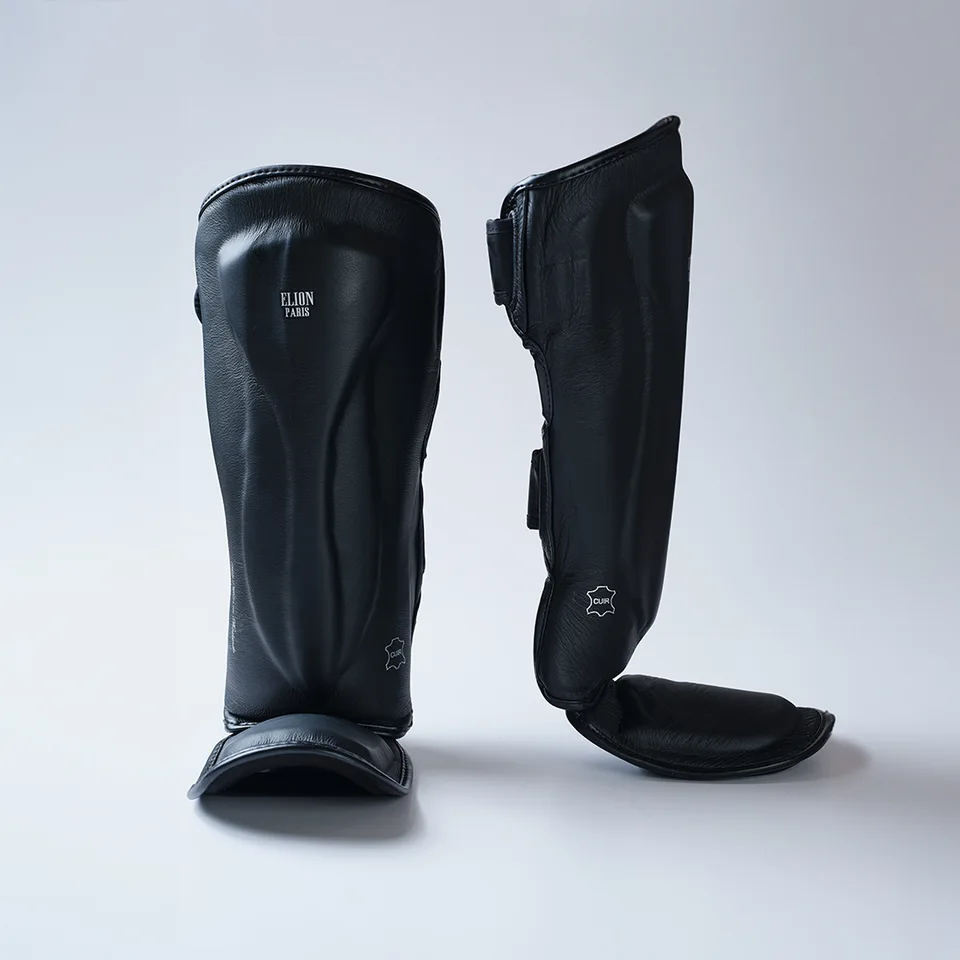 Protège-tibias et pieds Elion, cuir noir mat