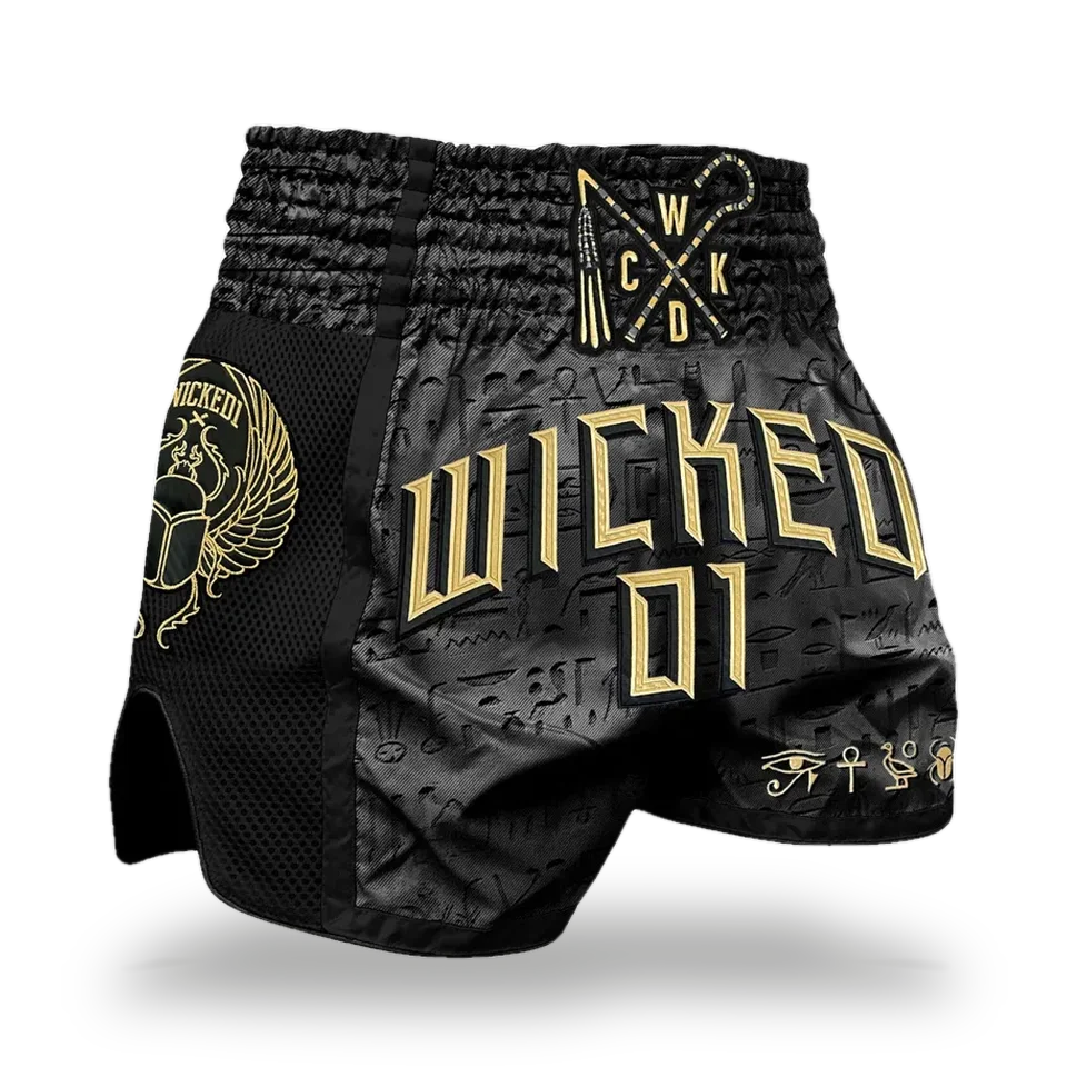Short de boxe thaï Wicked One Pharao, noir et or